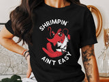 Funny Shrimp T-Shirt, Shrimpin Ain't Easy Tee, Cute Cartoon Lobster Shirt, Seafood Lover Gift, Humorous Graphic Tee