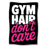 Black banner with "GYM HAIR don't care" in white and pink text.