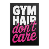 Gym hair don't care text on a black background.