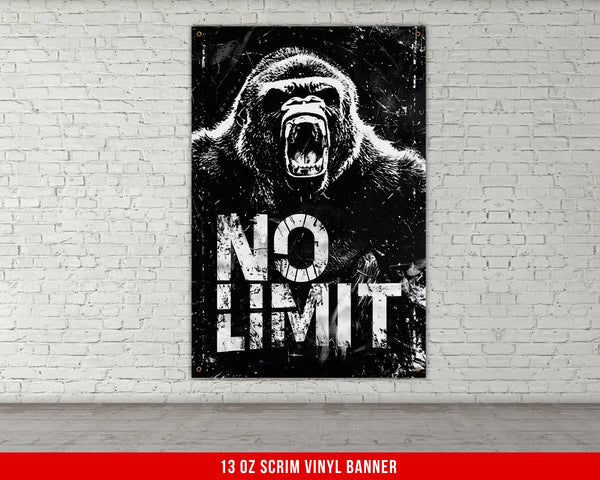 a black and white picture of a gorilla on a brick wall